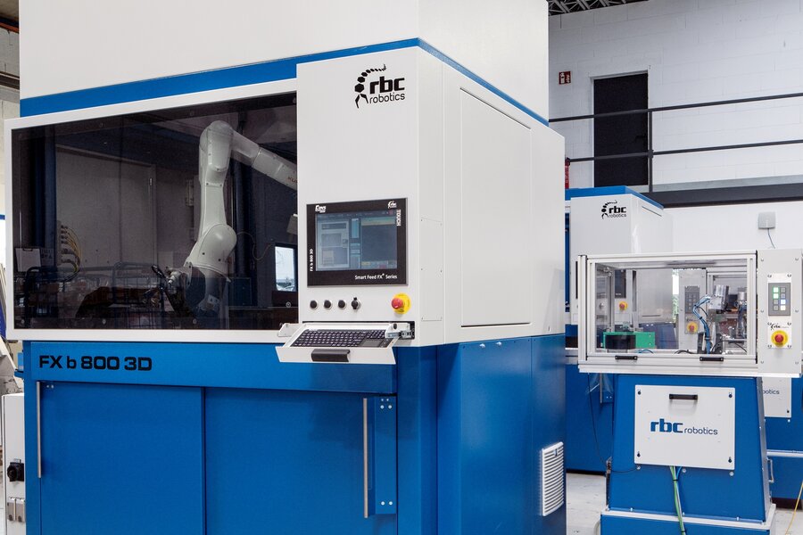 rbc robotics FX Pick 800 Automatisierungsanlage mit Bedienpanel und sichtbarem Arbeitsbereich.